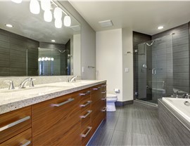 Luxury bathroom with wood cabinets