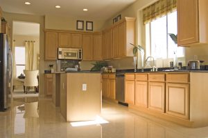 Natural light illuminating newly refaced kitchen cabinets