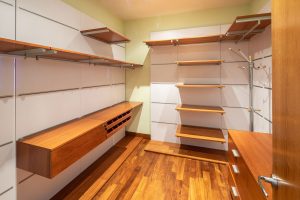 Empty closet with new organization system