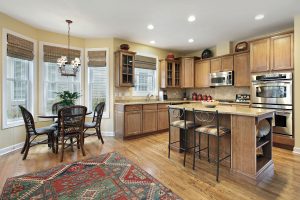 Kitchen with updated cabinets and small adjacent dining area